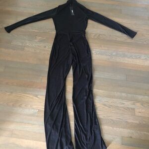 Fashion Nova Black Long Sleeve Jumpsuit with Wide-Leg Design